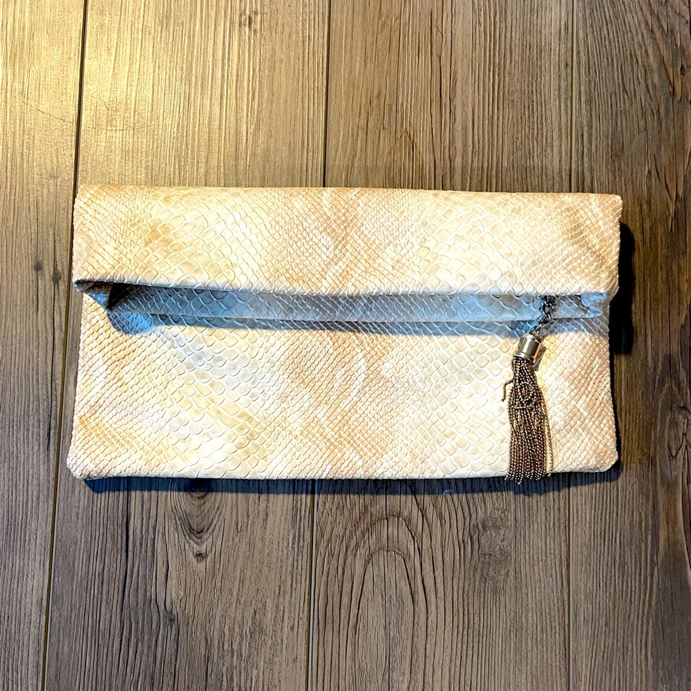 Beautiful Tan color snake print clutch